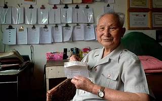 退休税务干部肖光盛：28年如一日助困助学