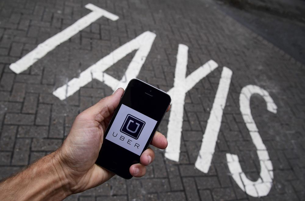 Uber推出带宠物乘车服务：额外支付2美元费用